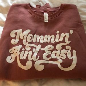 Mommin’ ain’t easy crew neck sweatshirt
